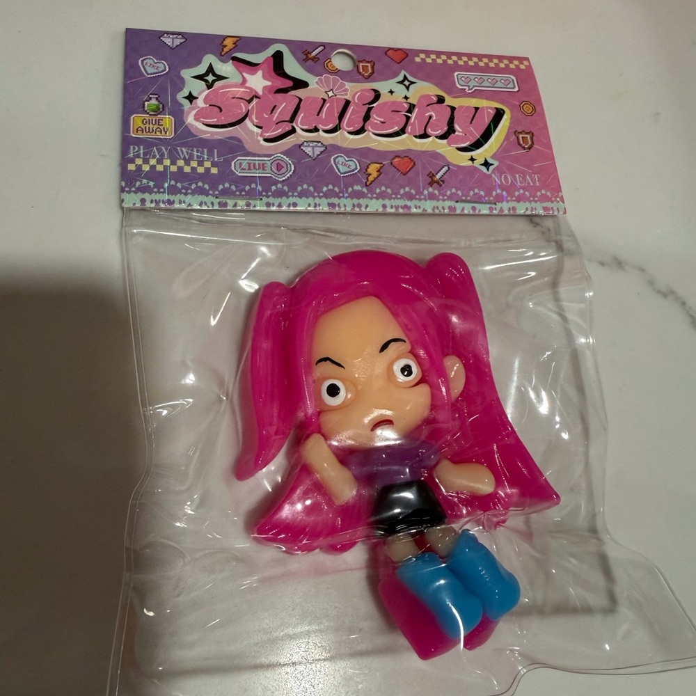 Pink and Blue Toy Figure
